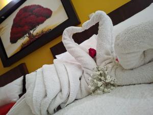 Postel nebo postele na pokoji v ubytování Hotel Tepoztlán