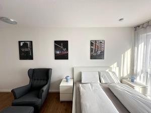 Postel nebo postele na pokoji v ubytování City Apartment mit Schlossblick