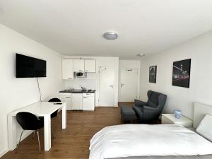 Kuchyň nebo kuchyňský kout v ubytování City Apartment mit Schlossblick