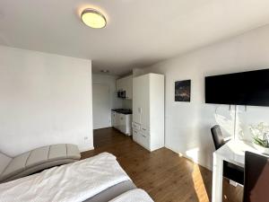 TV/trung tâm giải trí tại City Apartment mit Schlossblick