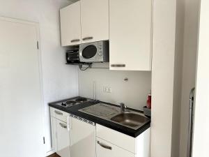Nhà bếp/bếp nhỏ tại City Apartment mit Schlossblick