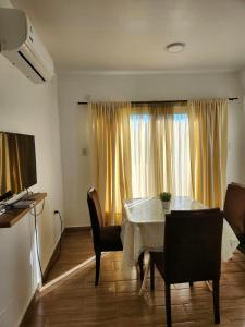 Istumisnurk majutusasutuses Habitaciones con amplia terraza a minutos del centro