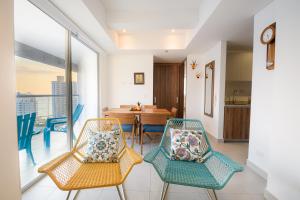 Χώρος καθιστικού στο RODADERO EXCLUSIVO - 2hab Suite a METROS DEL MAR