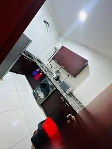 an overhead view of a kitchen in an apartment at Emerald luxe with constant power in Lagos