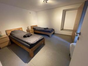 Llit o llits en una habitació de Base Amsteg