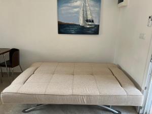 Postel nebo postele na pokoji v ubytování Vergia Apartment 1