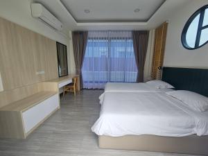 Katil atau katil-katil dalam bilik di Ayutthaya Pool Villa
