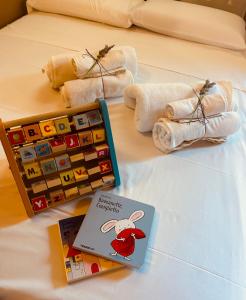 A bed or beds in a room at Casale Dolci Dimore