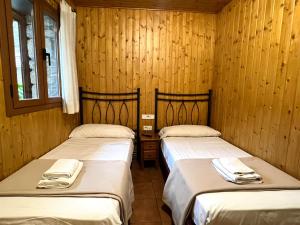 A bed or beds in a room at Casa Franch - L'Amfitriona