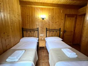 A bed or beds in a room at Casa Franch - L'Amfitriona