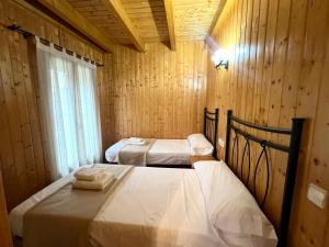 A bed or beds in a room at Casa Franch - L'Amfitriona