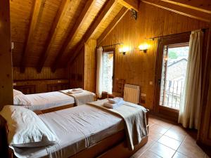 A bed or beds in a room at Casa Franch - L'Amfitriona