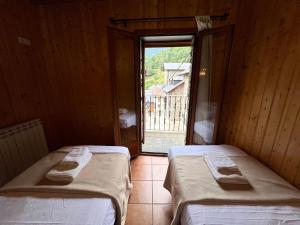 A bed or beds in a room at Casa Franch - L'Amfitriona