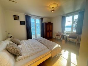 Ein Bett oder Betten in einem Zimmer der Unterkunft Seehotel Schwert