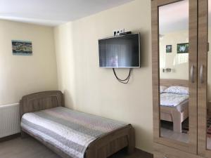 TV a/nebo společenská místnost v ubytování Diána-Vendégház