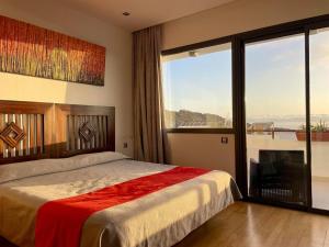 Postel nebo postele na pokoji v ubytování Villa Casa Flamboyant + 37 fotografií