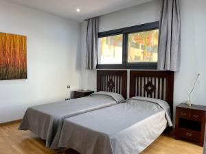 Postel nebo postele na pokoji v ubytování Villa Casa Flamboyant