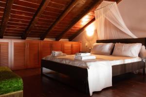 Postel nebo postele na pokoji v ubytování KD Rustic Home