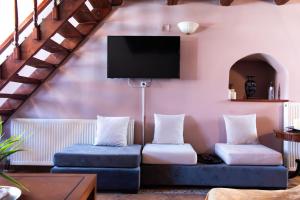 TV a/nebo společenská místnost v ubytování KD Rustic Home