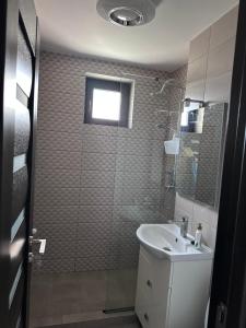Koupelna v ubytování Central Apartament -Târgu Ocna