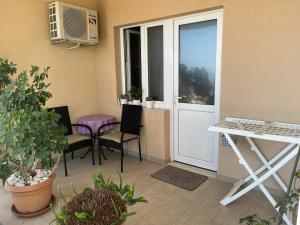 Kuchyň nebo kuchyňský kout v ubytování Apartments Nevenka i Josko