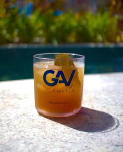 a drink in a glass sitting on a table at Salinas Premium Resort in Salinópolis