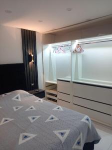 En eller flere senge i et værelse på Dpto Amoblado ILO-PERU