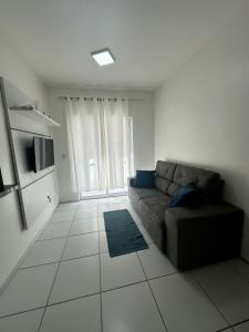 Χώρος καθιστικού στο Apartamento de dois quartos, competo, em São Luis, Araçagy
