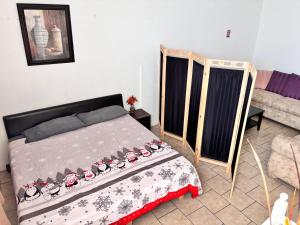 Ένα ή περισσότερα κρεβάτια σε δωμάτιο στο Casa amplia +19 φωτογραφίες