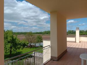 a balcony with a view of a field at CASA MIGUEL y SALLY in Villanueva de las Manzanas