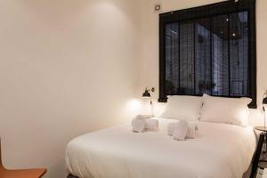 Postel nebo postele na pokoji v ubytování DIFY Dauphiné - Part Dieu