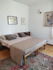 Ένα ή περισσότερα κρεβάτια σε δωμάτιο στο Appartamento vette feltine
