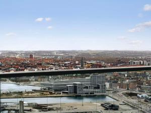 a view of a city with a bridge and buildings at 5 star holiday home in Aarhus C in Aarhus
