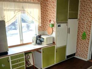 Η κουζίνα ή μικρή κουζίνα στο 12 person holiday home in Lidsjöberg