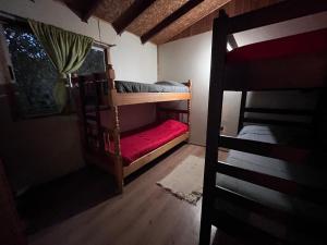 Postel nebo postele na pokoji v ubytování Mirador del Rukapillan en Likan Ray