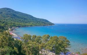 a view of a beach with people in the water at Lovely Apartment In Agropoli With Wifi in Agropoli