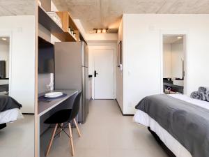 Ένα ή περισσότερα κρεβάτια σε δωμάτιο στο DM 1204 Tranquilidade e Conforto proximo à Unifesp, Hospitais e Metrô Vila Mariana