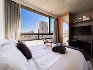 Ένα ή περισσότερα κρεβάτια σε δωμάτιο στο DM 1204 Tranquilidade e Conforto proximo à Unifesp, Hospitais e Metrô Vila Mariana