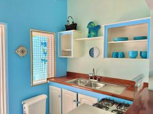 A kitchen or kitchenette at Aqua