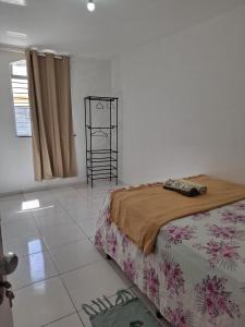 Postel nebo postele na pokoji v ubytování Quarto Confortável no Centro + 17 fotografií