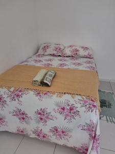 Postel nebo postele na pokoji v ubytování Quarto Confortável no Centro