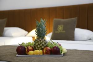 a tray of fruit on a table in a hotel room at Gezgin Hotel in Edirne