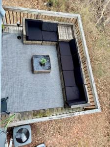 an aerial view of a patio with a potted plant at Vintage Queen Suite - 7 mins From ATL Airport in Riverdale