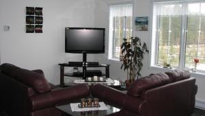 The lounge or bar area at Appartement de l'Ange