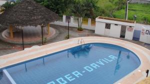 an overhead view of a swimming pool at a resort at Playa Azul in Tonsupa +4 photos