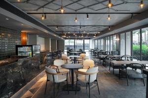 TV a/nebo společenská místnost v ubytování Radisson Hotel Don Mueang Bangkok