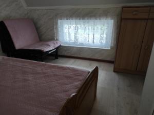 Postel nebo postele na pokoji v ubytování Guest house Family
