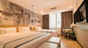 Postel nebo postele na pokoji v ubytování City Comfort Inn Chongqing Jiangbei International Airport + 141 fotografií