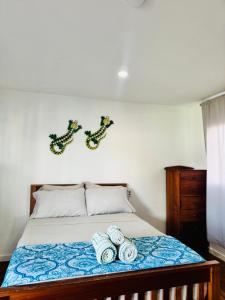 Voodi või voodid majutusasutuse Go Slow Guesthouse toas