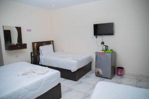 Katil atau katil-katil dalam bilik di THE PYRAMIDS HOTEL VIEw